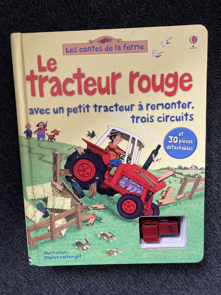 Książka po francusku z jeżdżącym traktorem