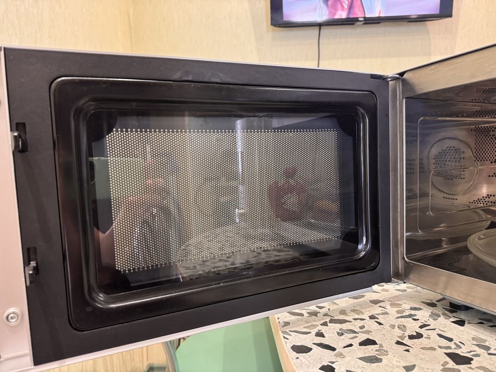 Мікрохвильова піч з конвекцією Candy CMC 9528 DS