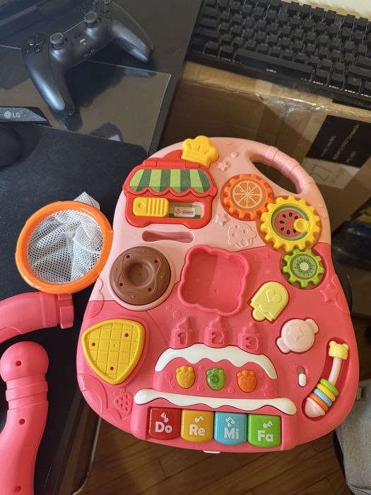 Дитяча каталка‑ходунки