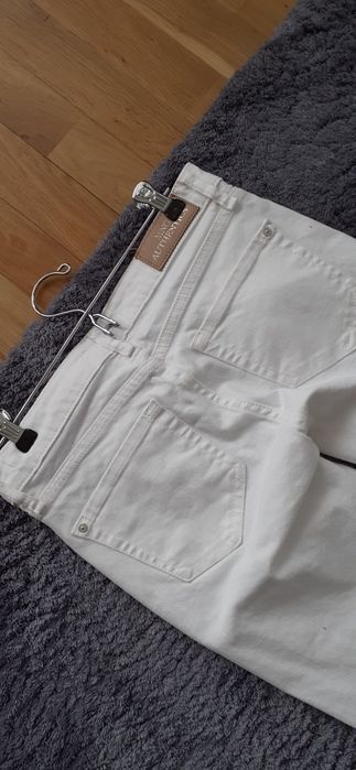 Białe spodnie Mango stan idealny r. 34 jeans