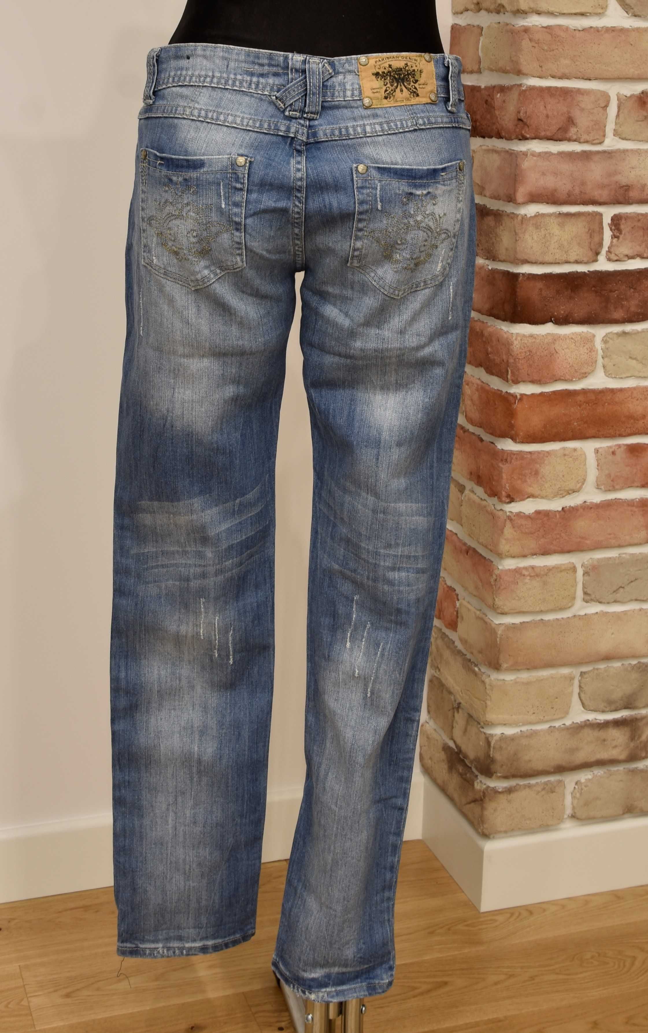 Jeansy spodnie z rozdarciami 38