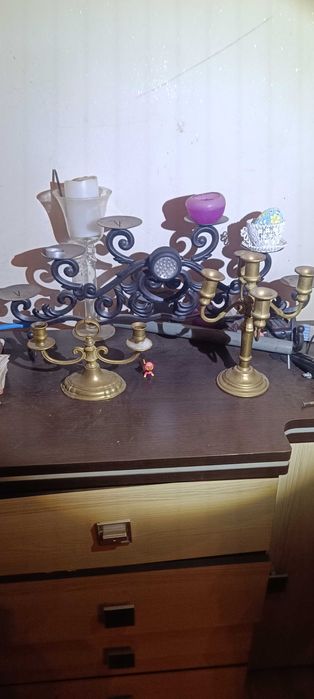 Świeczniki żeliwne i mosiężne