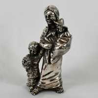 Grupo escultórico de mãe Mexicana e filhos em folha de prata