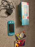 Nintendo Switch Lite + gry