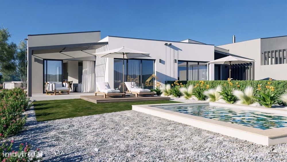 Moradia geminada T2 dentro do Golfe e da natureza