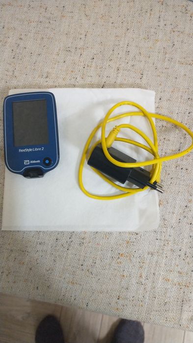 показано рідер (сканер) системи безперервного моні
На зображенні показ