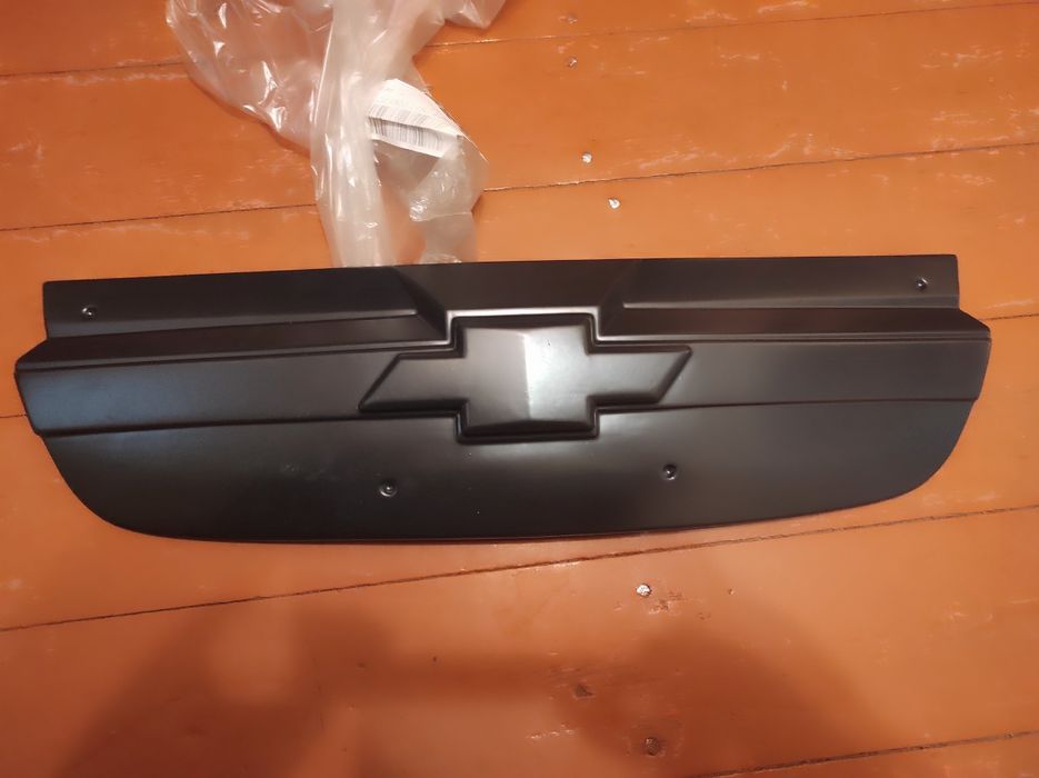 Заглушка радіатора Шевроле авео