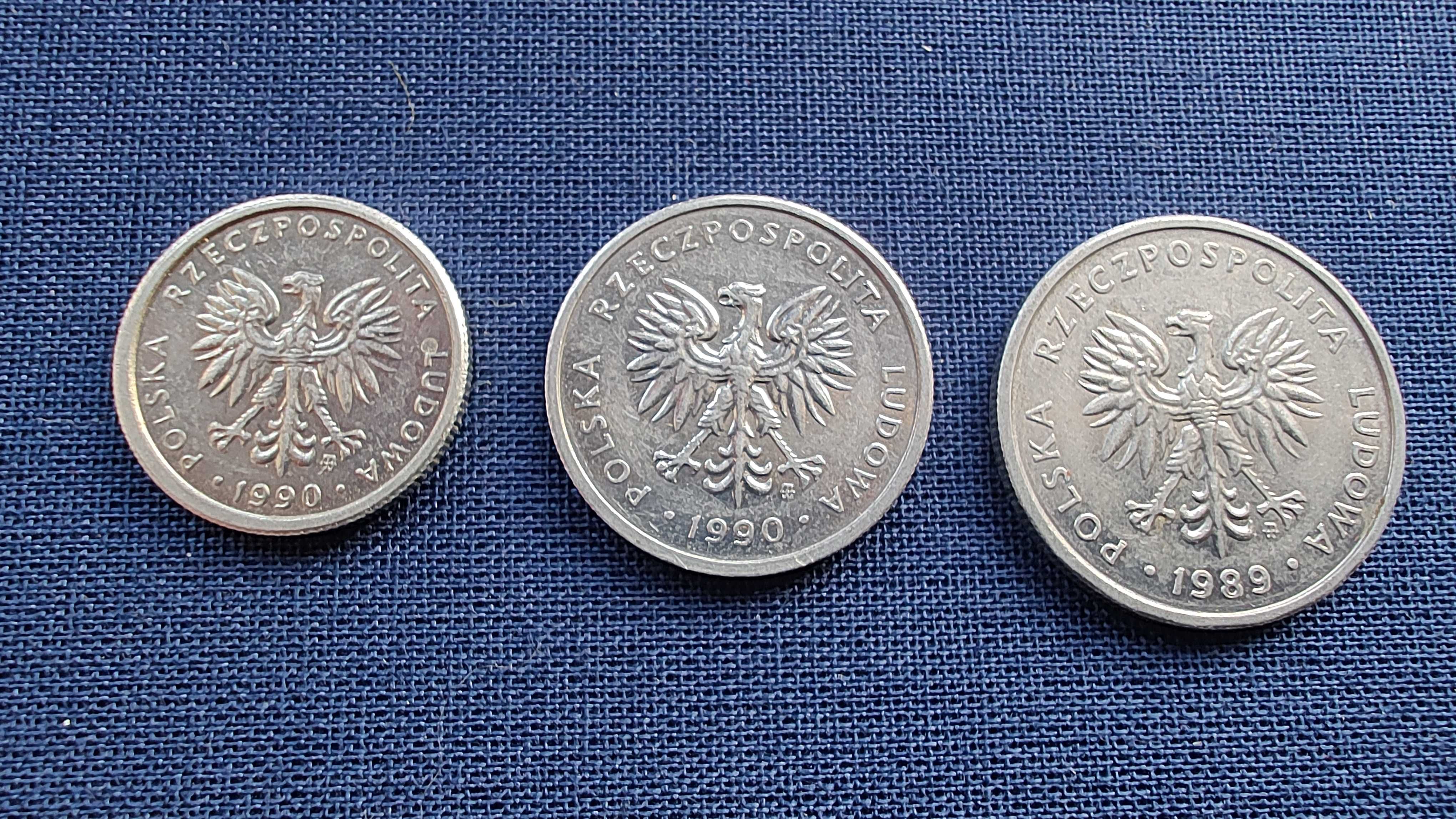 3 monety jeden, dwa i piec złotych.