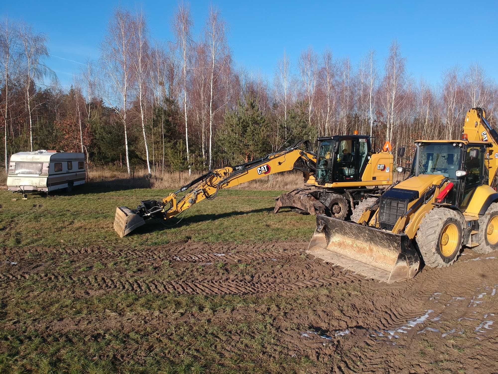 Wyburzenia budynków, rozbiórki – wywóz i utylizacja gruzu CAT M315