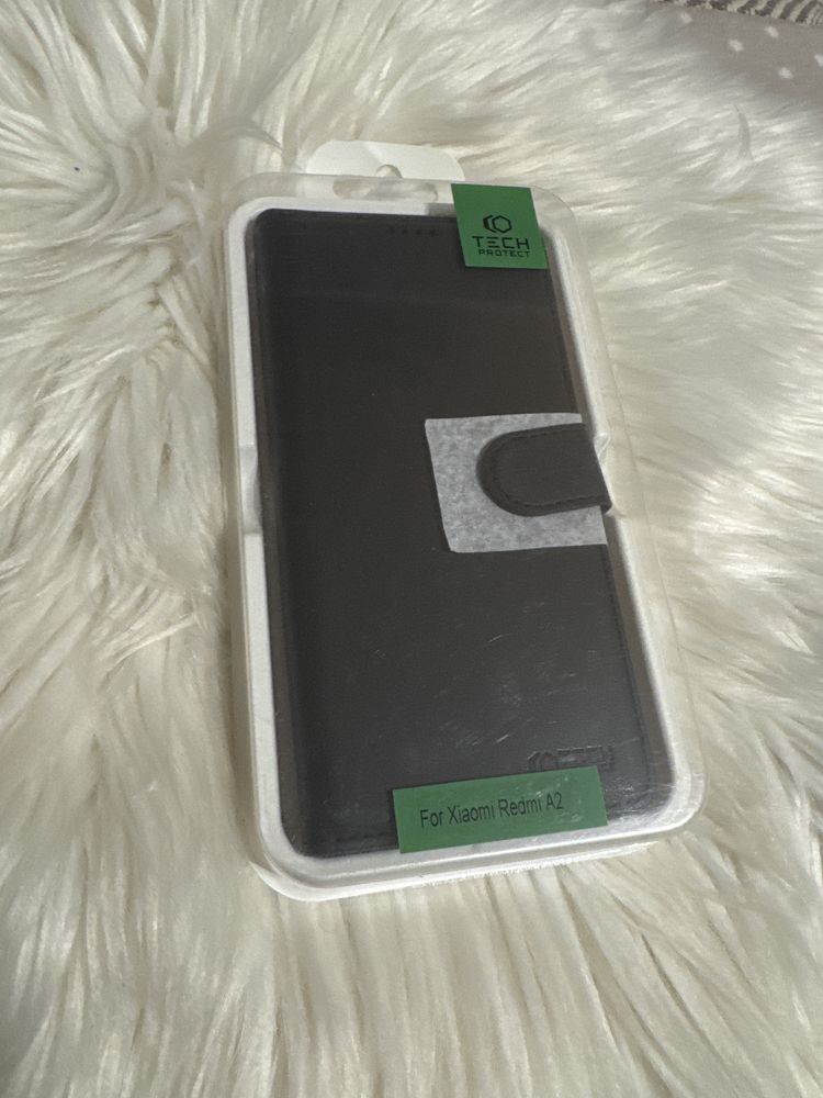Etui do smartfona Xiaomi Redmi A2 zamykane klapka.