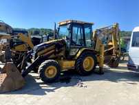 Caterpillar 428D koparko ładowarka