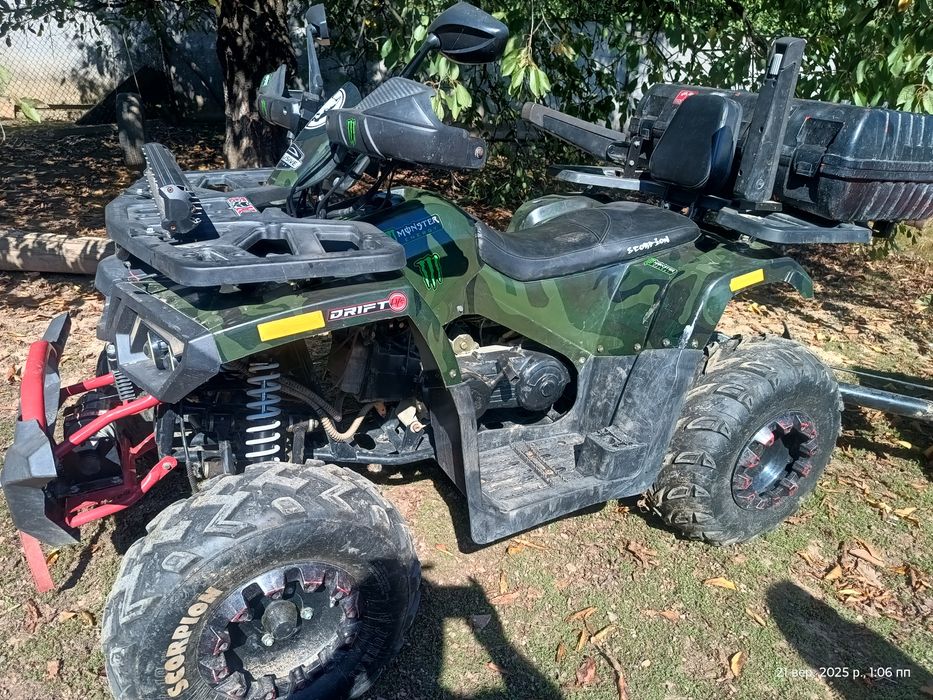 Квадроцикл з прицепом