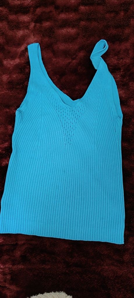 Top azul turquesa tamanho M, usada