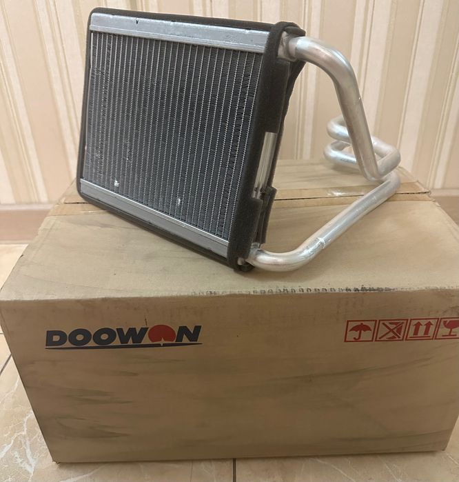 Радіатор обігрівача пічки Hyundai Tucson