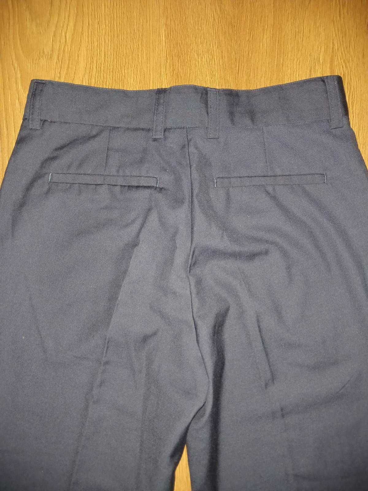 темно-синие тонкие брюки на мальчика NEXT на 11-12лет 146-152см.