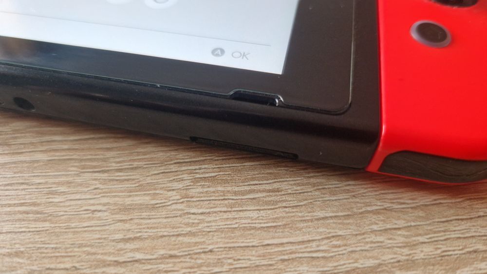 Consola Nintendo Switch e vários acessórios