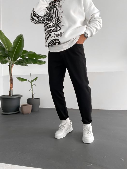 Чорні чоловічі джинси мом