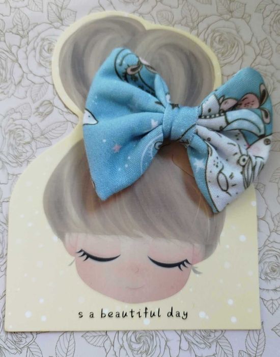 Niebieskie spinki kokardki