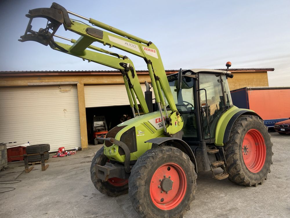 Claas Arion 410 z ładowaczem