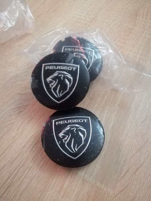 Kapsle Peugeot nowe