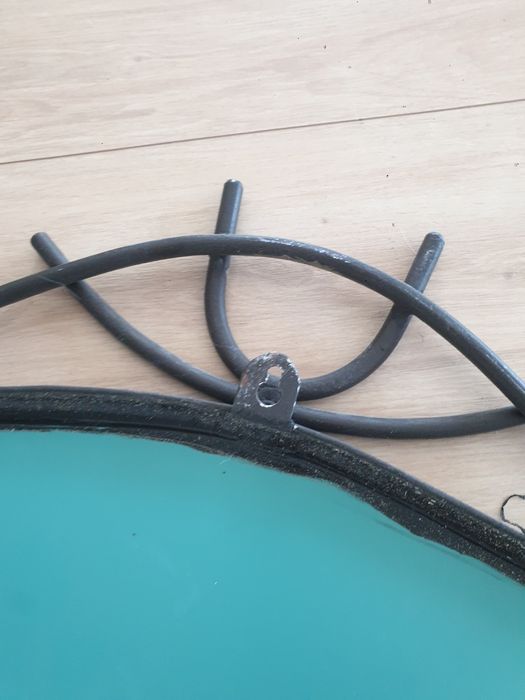 Lustro lusterko w metaloplastyce w kutej ramie metalowej