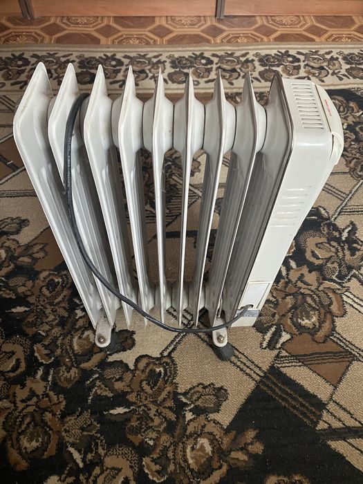 Масляний обігрівач