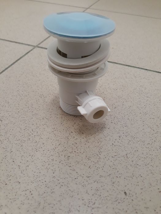 Korek do umywalki z przelewem