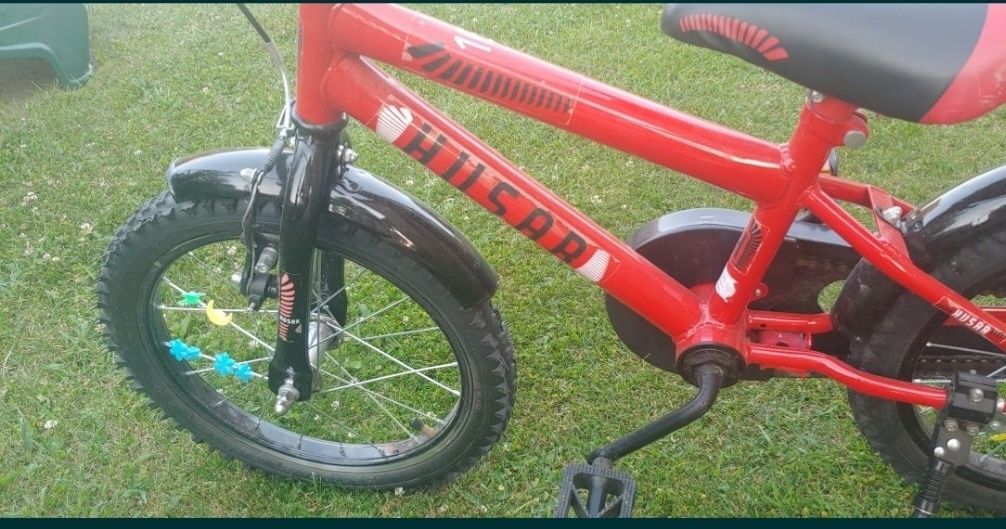 Czerwony rower Husar, koła 16, drążek,  kółka boczne