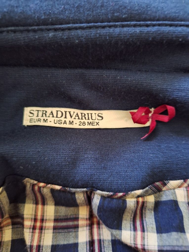 Casaco comprido azul da Stradivarius - M