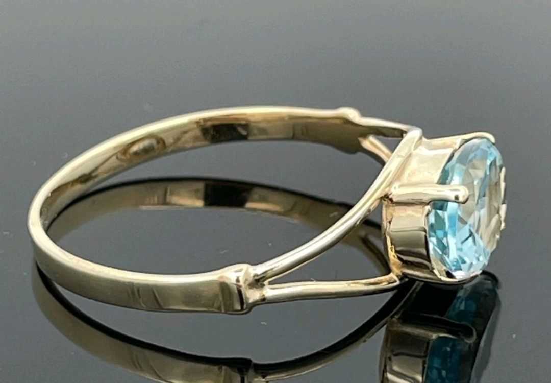 Złoty pierścionek niebieski topaz + certyfikat