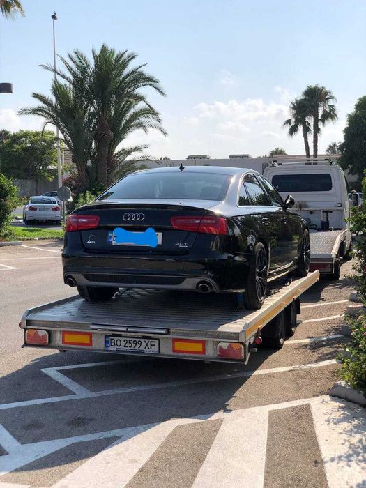 Доставка авто та мото на евакуаторі з України в Європу та навпаки!