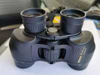 Компактный маломасивный спортивный бинокль Nikon Action 7x35