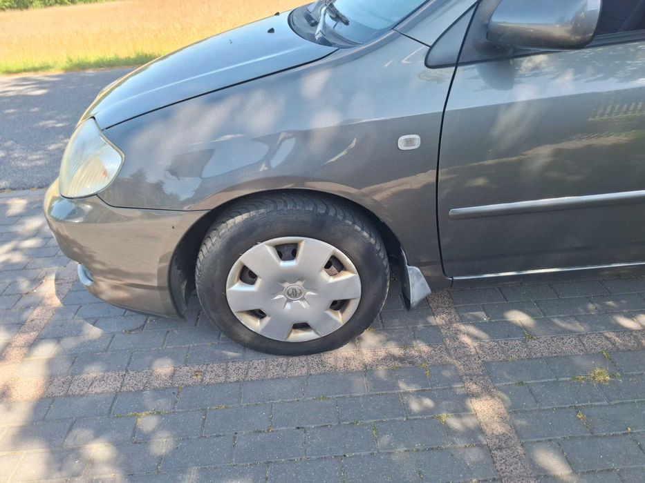 Toyota Corolla E12 błotnik przód L+P strona kolor 1C3