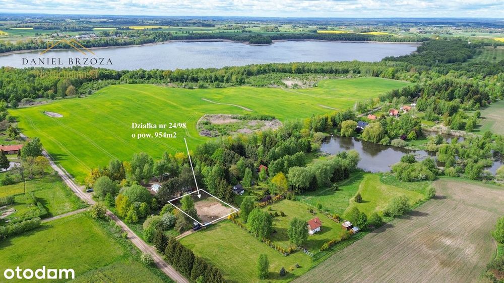 Malowniczo położona działka 954 m² z altaną, przyczepą