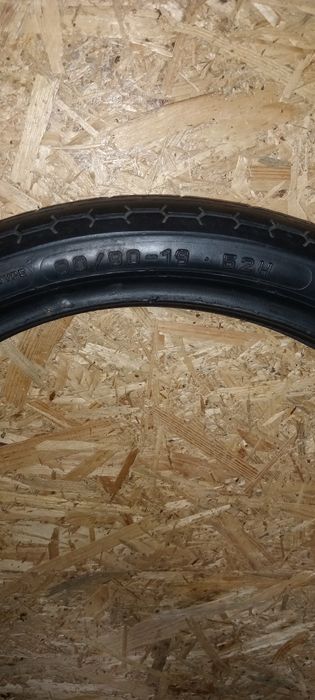 Два блоки двигуна моиоцикла Урал , Передня мото гума Metzeler 90/90-19