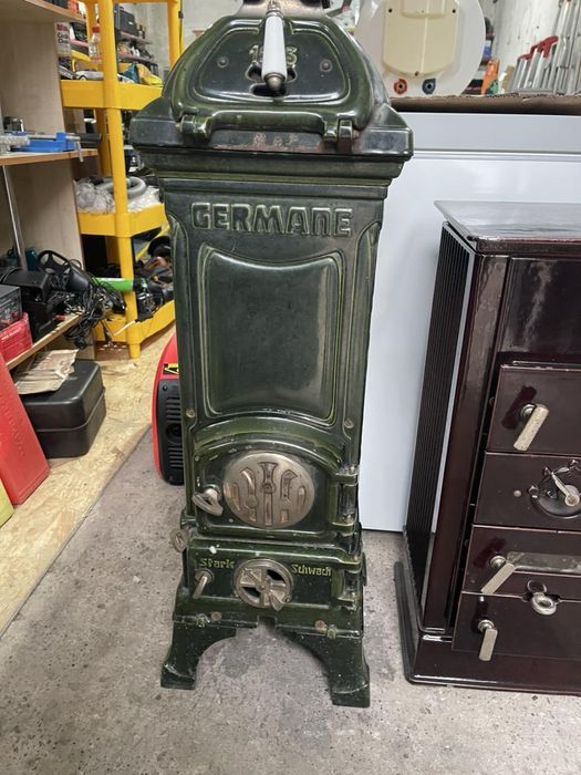 Старовина дровʼяна піч «буржуйка»