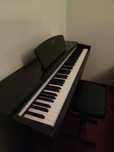 Piano Yamaha Arius YDP-135R c/ banco