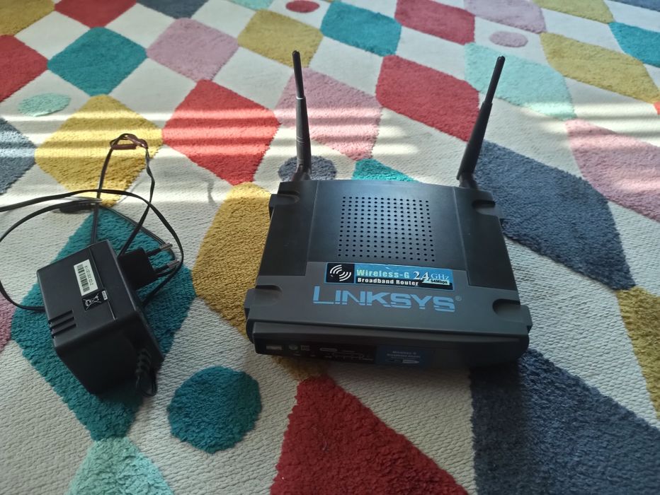 Ruter Linksys WRT54GL stan bdb