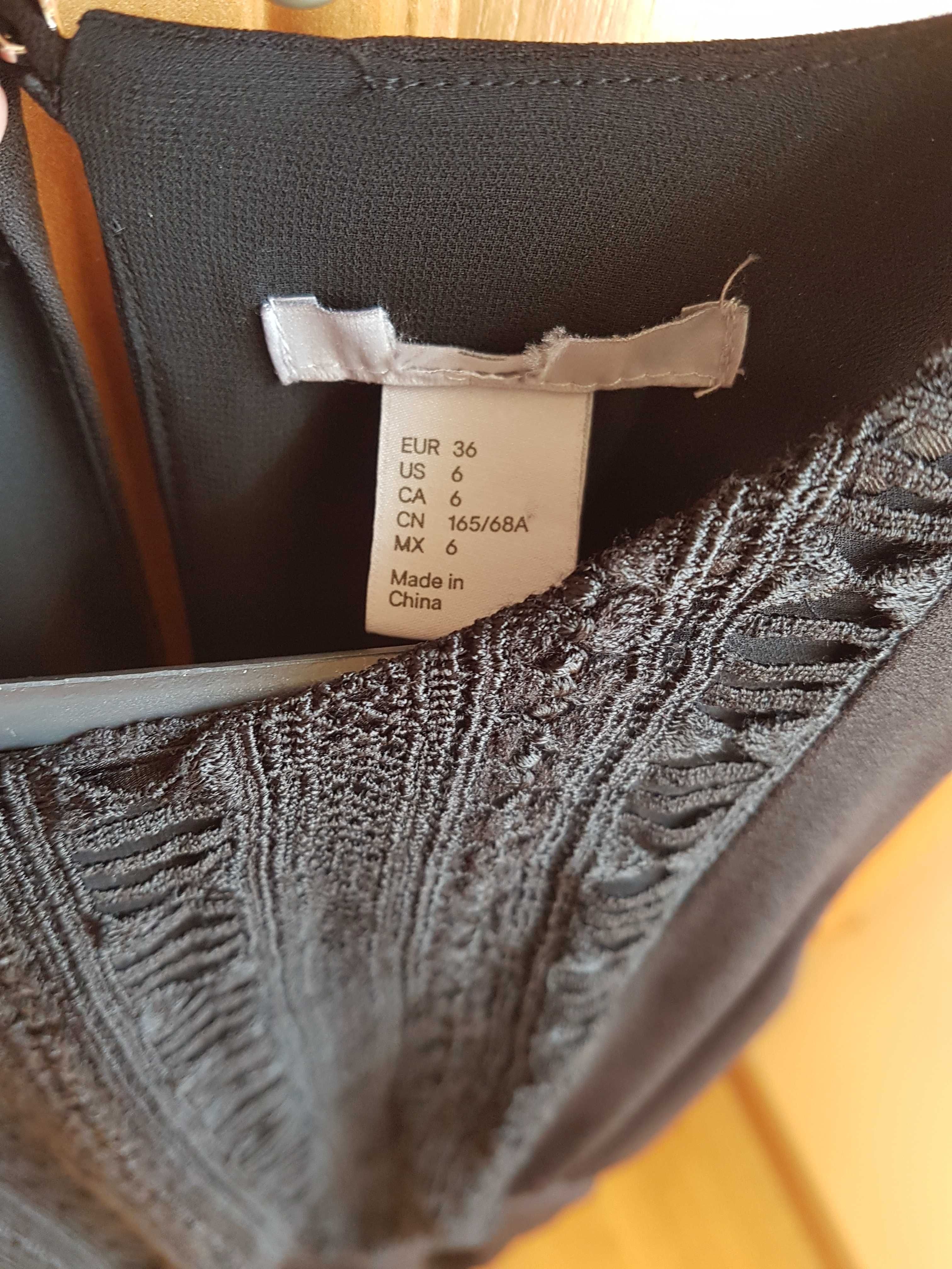 Czarny kombinezon H&M