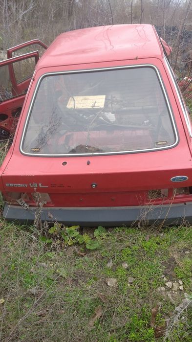 форд ескорт скло