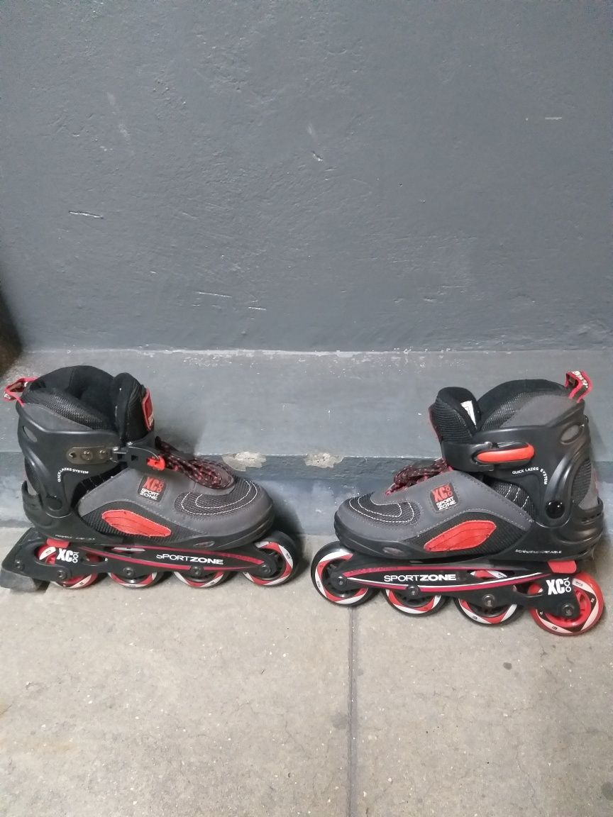 Patins em linha semi novos.