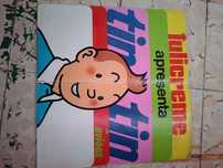 Caderneta de cromos Tulicreme-Tintin em aviões