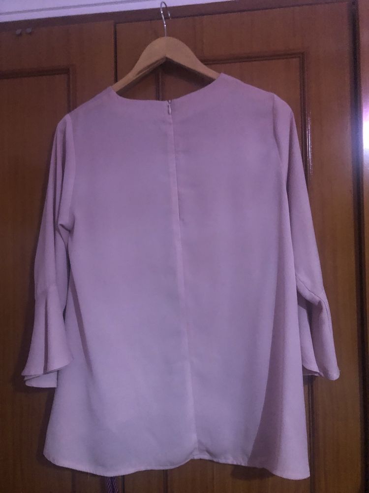 Blusa rosa velho clara