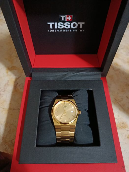 Relógio mulher Tissot PRX dourado