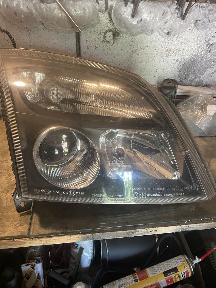 Farol dir opel vectra