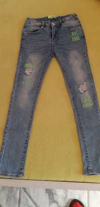 Spodnie jeansowe Happy house dziewczęce  w rozmiarze 146/152 cm