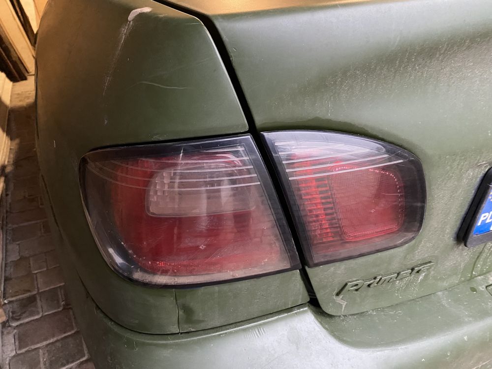 Задняя и пердняя оптика Nissan Primera P11  фара стопсигнал