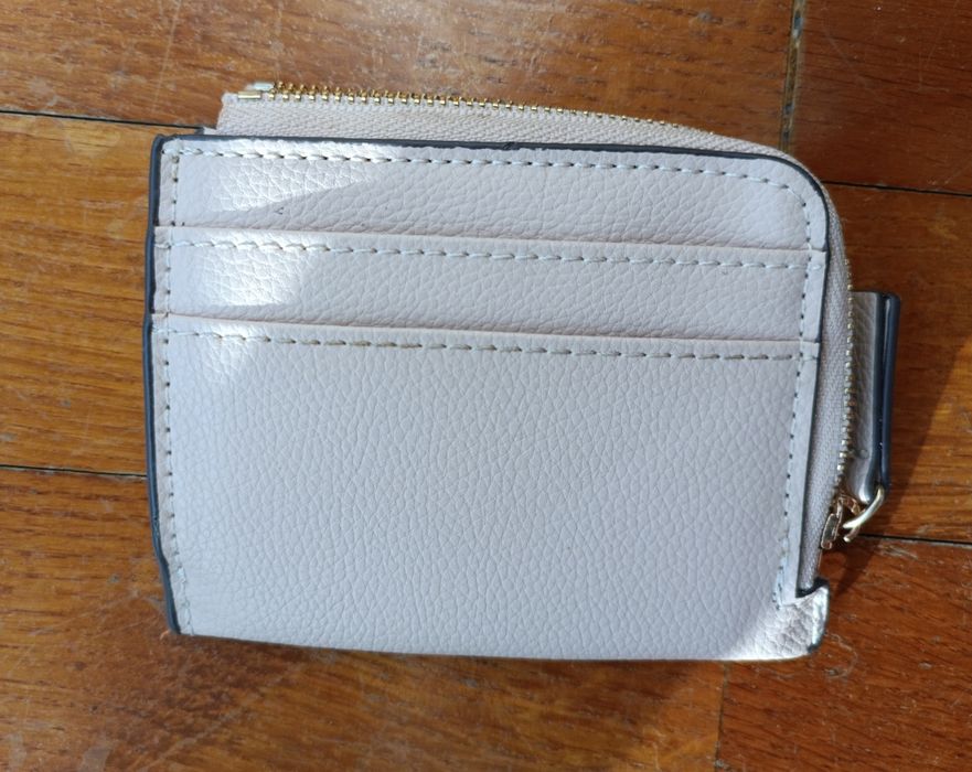 Carteiras como novas