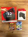 # Nintendo Switch 2 + Switch Pro Controller 2 + Gry # jak NOWE ! #