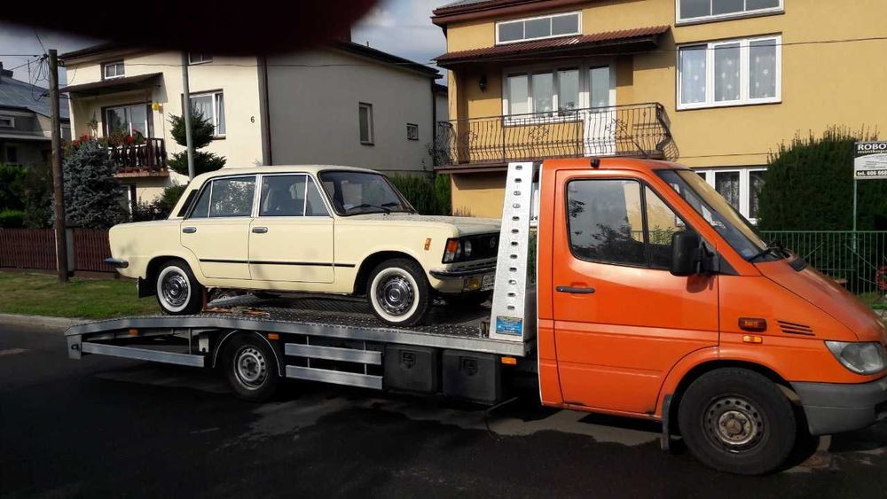 Autolaweta pomoc drogowa holowanie usługi transportowe